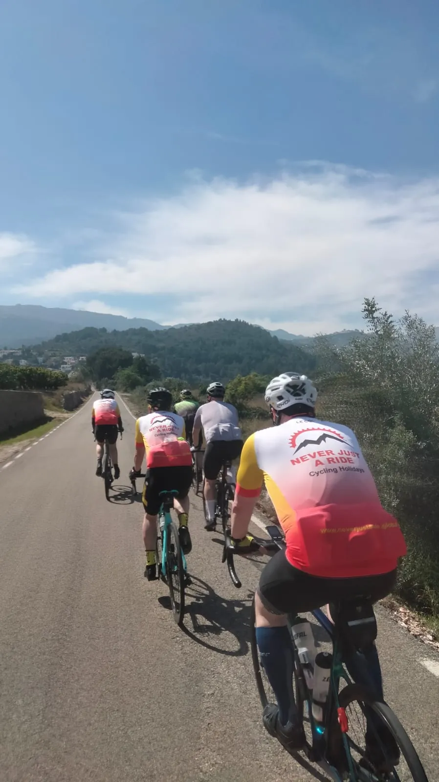 Road cycling group riding through the Costa Blanca countryside